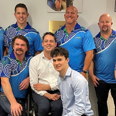 Denzel Strauss (foreground) at his scholarship presentation with Baidam Solutions staff including CEO Phillip (Pip) Jenkinson (kneeling in second row)